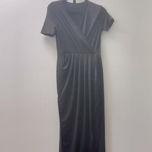 Chic Black Fringe Wrap Dress – Elegant & Effortless NTW